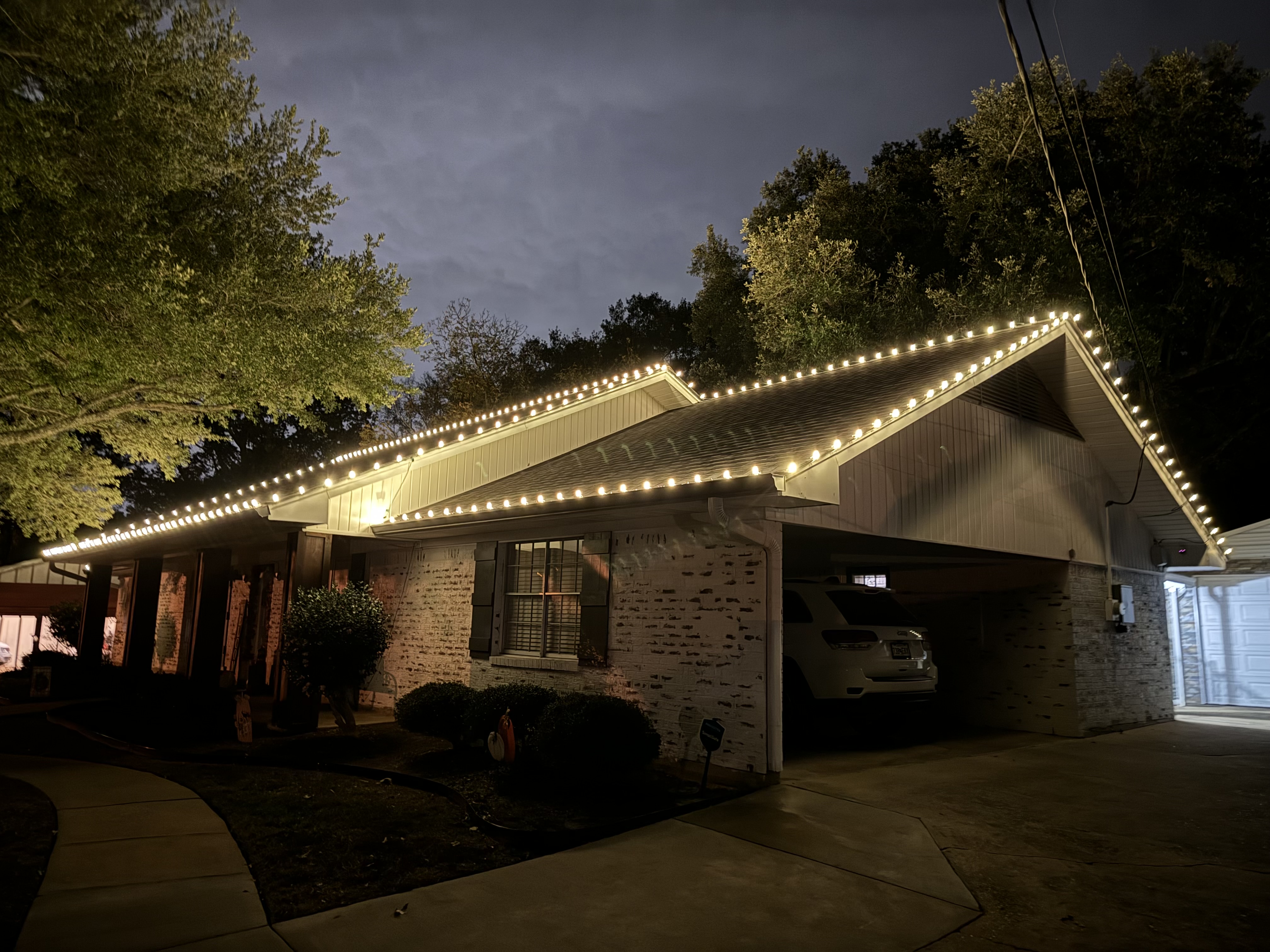 Holiday lighting installed on a home in the Raleigh area