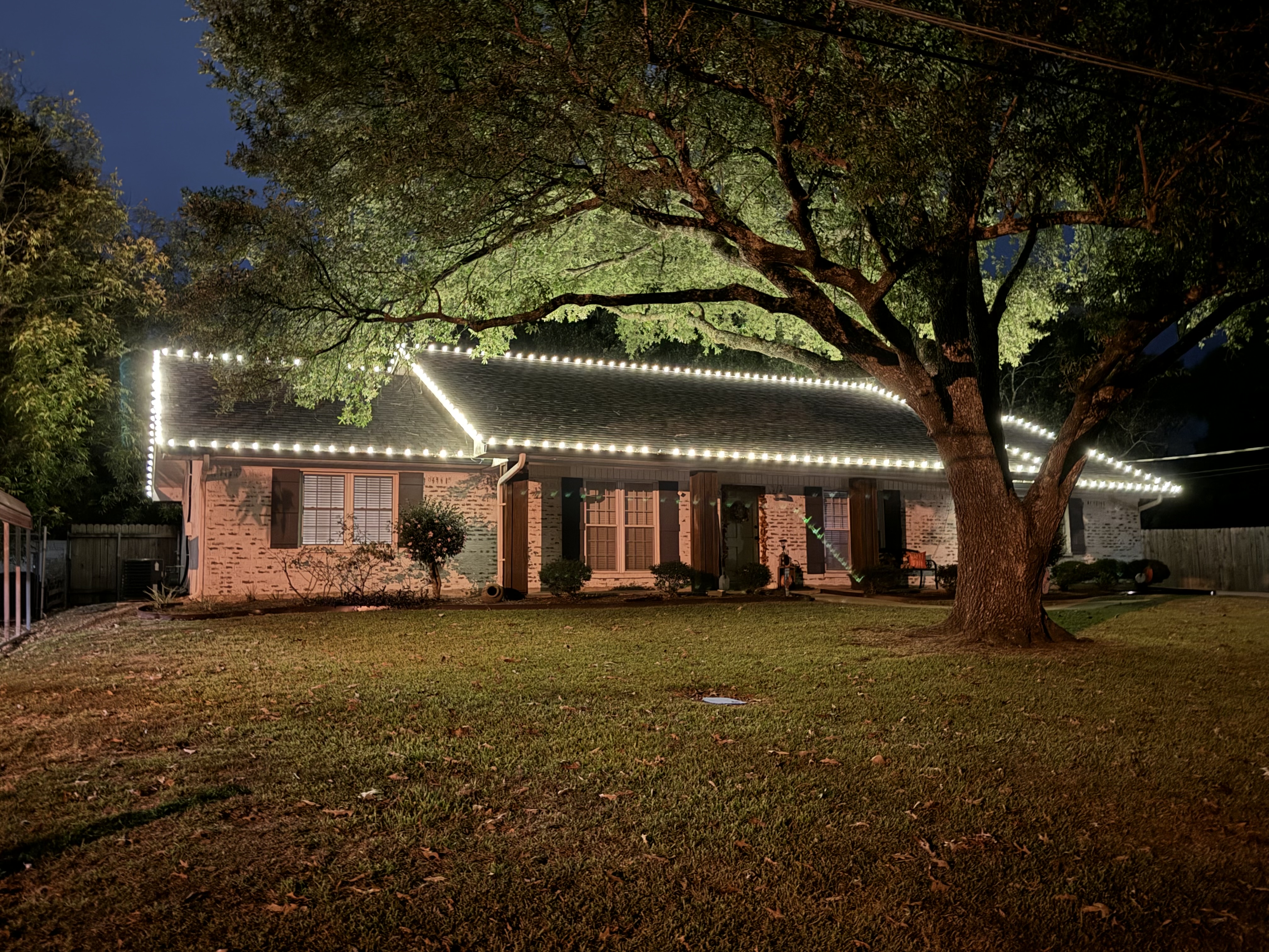 Holiday lighting installed on a home in the Raleigh area