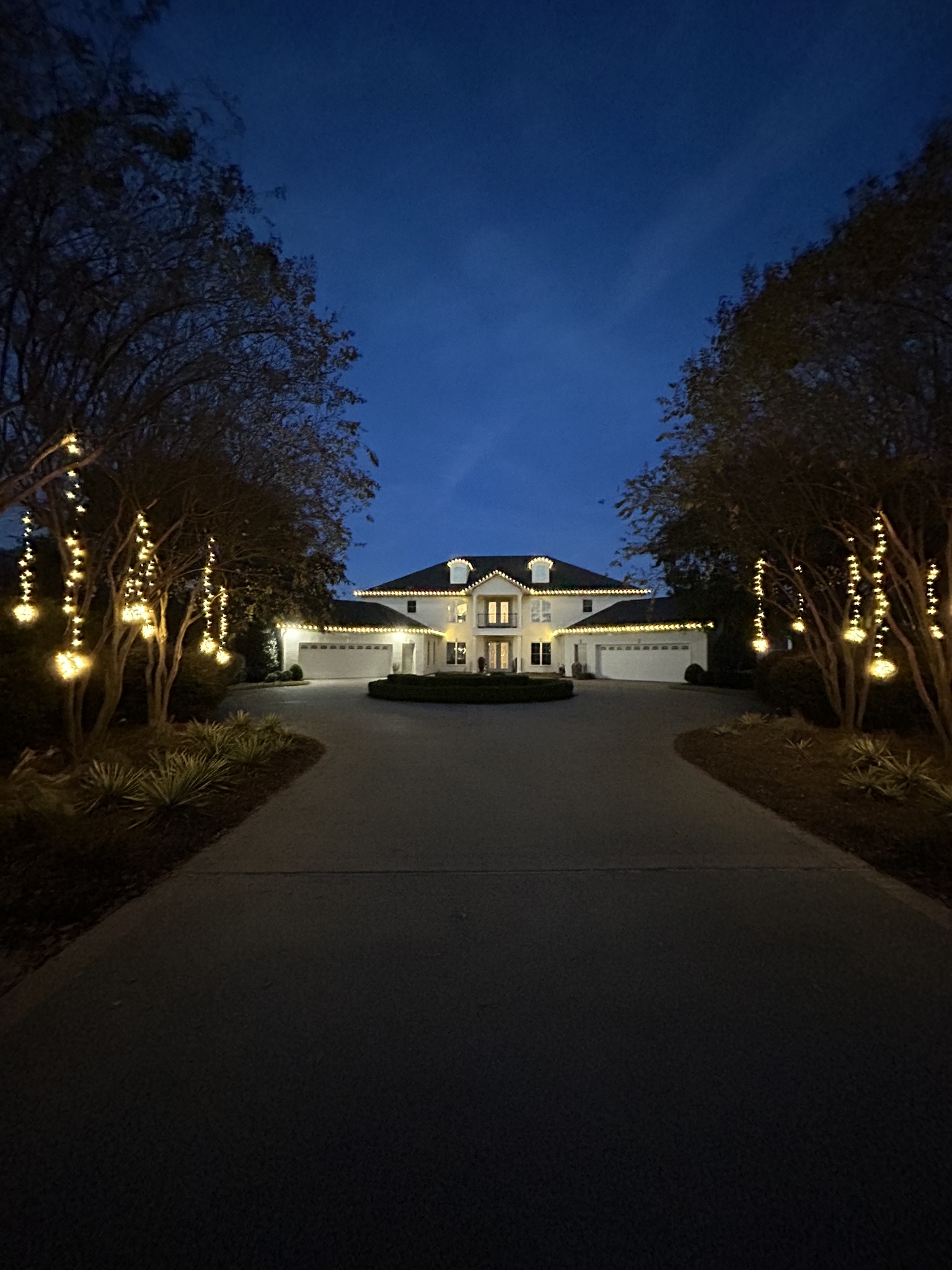 Holiday lighting installed on a home in the Raleigh area