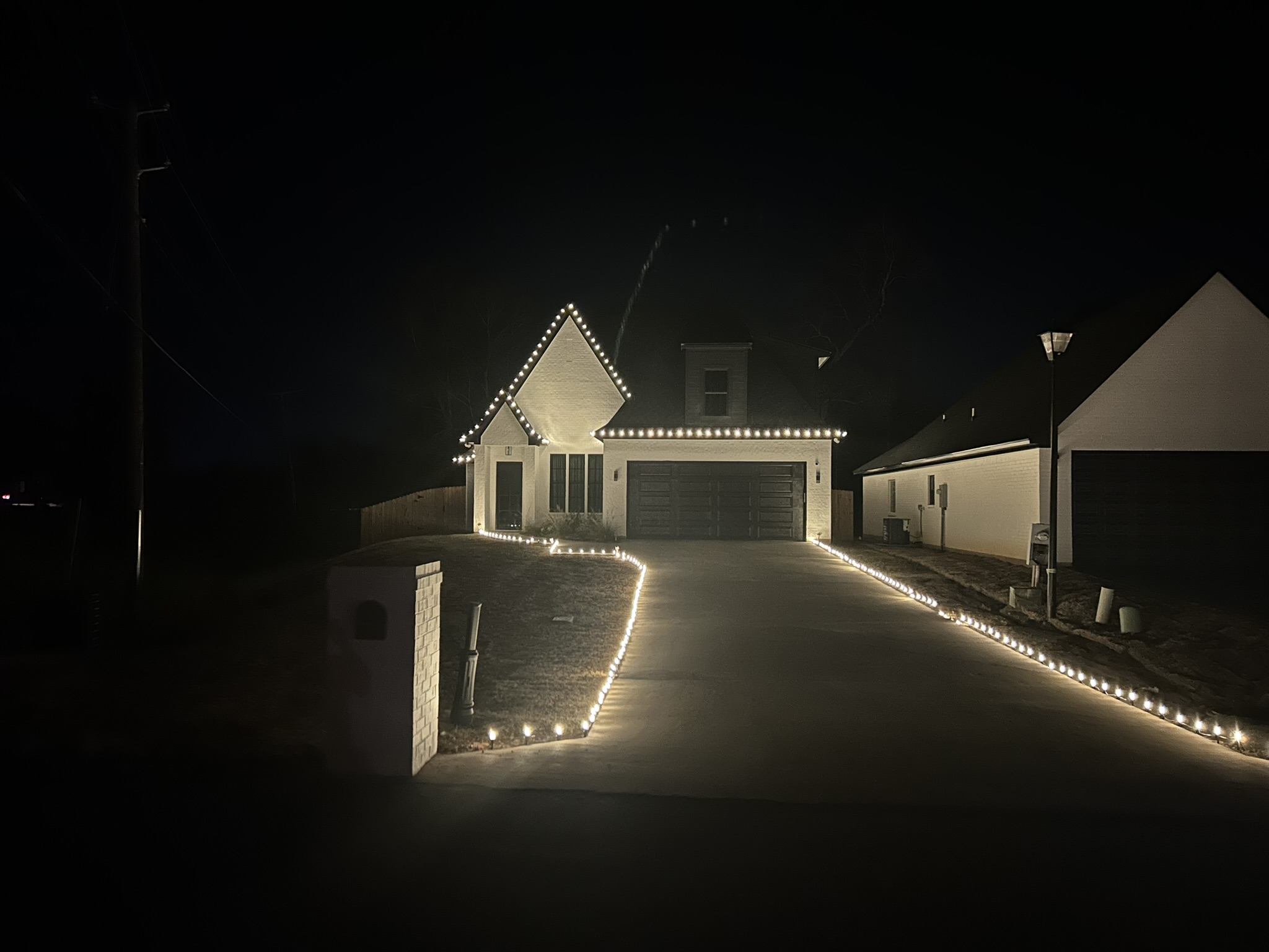 Holiday lighting installed on a home in the Raleigh area