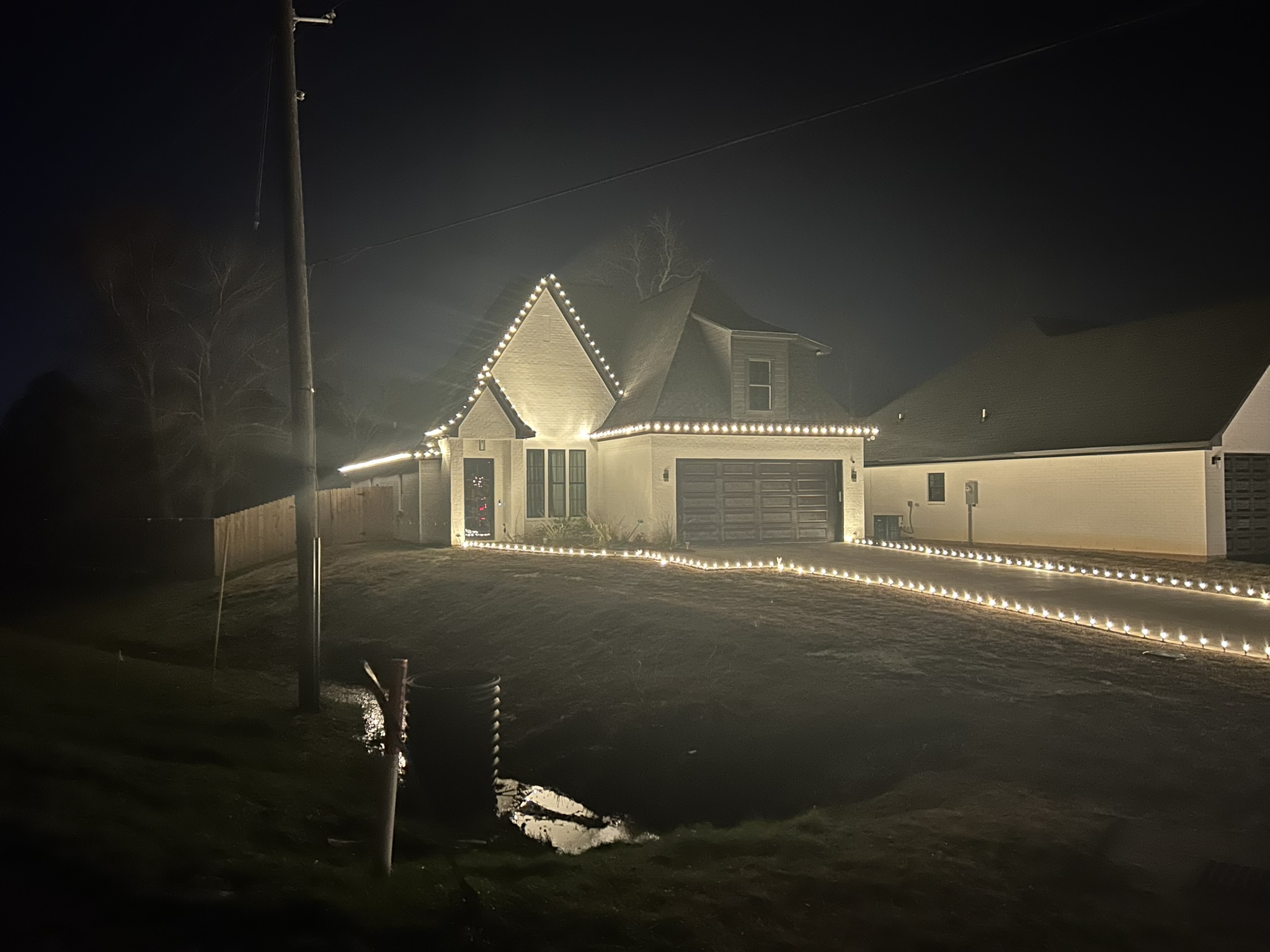 Holiday lighting installed on a home in the Raleigh area