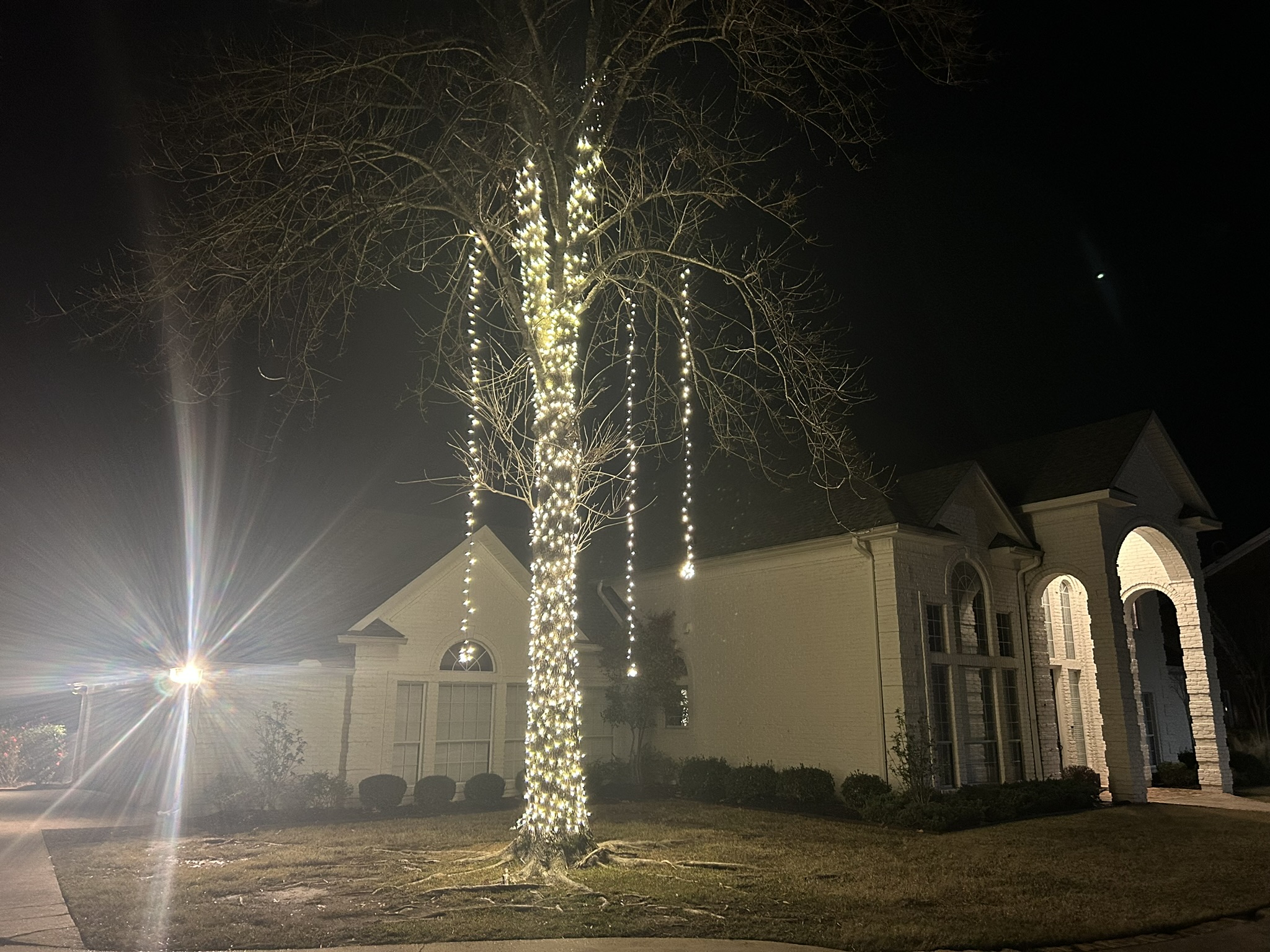 Holiday lighting installed on a home in the Raleigh area
